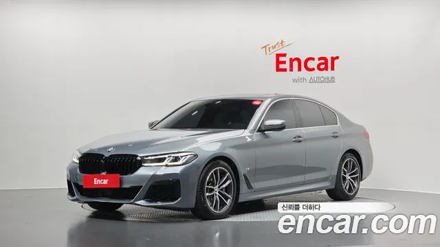 BMW 5-Series 2023 — photo 1