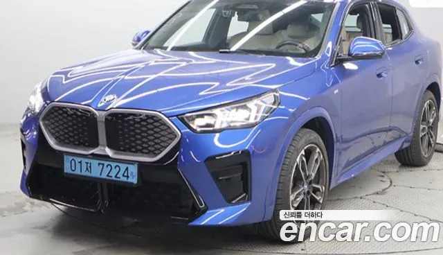 BMW iX2 2024 — photo 1
