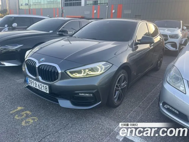 BMW 1-Series 2021 — photo 1