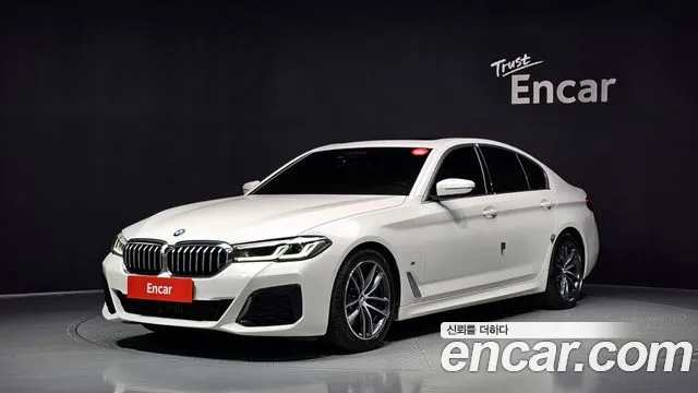 BMW 5-Series 2022 — photo 1