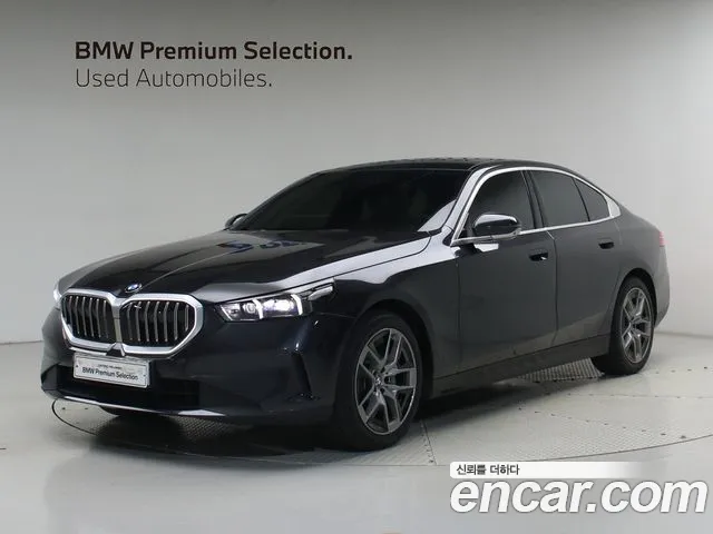 BMW 5-Series 2024 — photo 1
