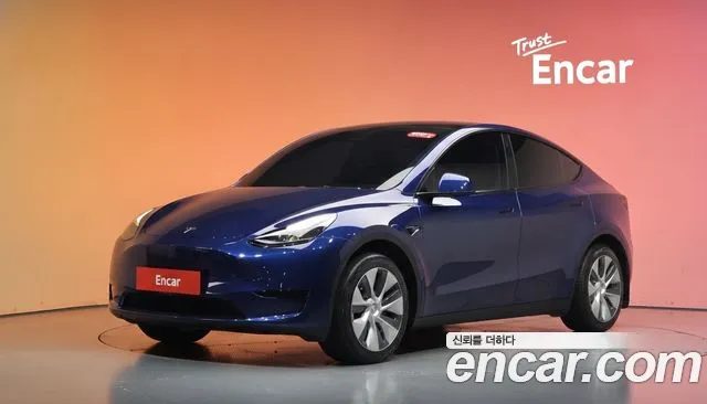 Tesla Model Y 2024 — photo 1