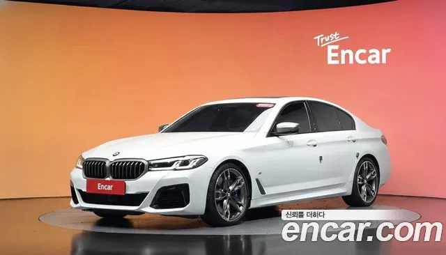 BMW 5-Series 2021 — photo 1