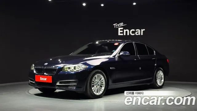 BMW 5-Series 2015 — photo 1
