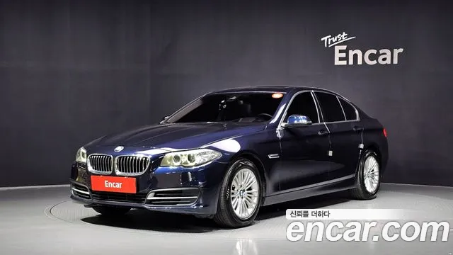 BMW 5-Series 2014 — photo 1
