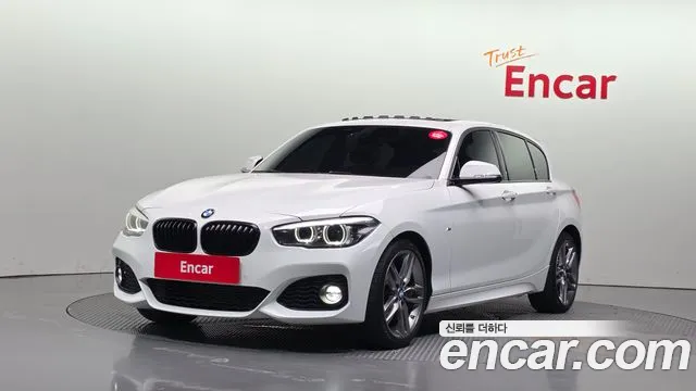BMW 1-Series 2018 — photo 1