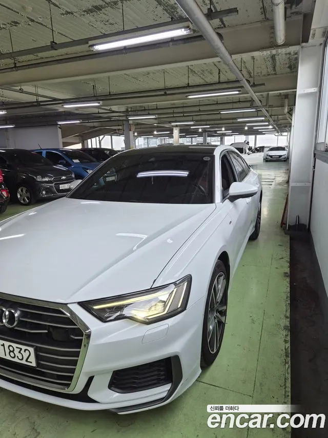 Audi A6 2023 — photo 1