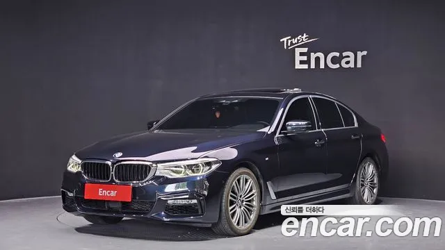 BMW 5-Series 2018 — photo 1