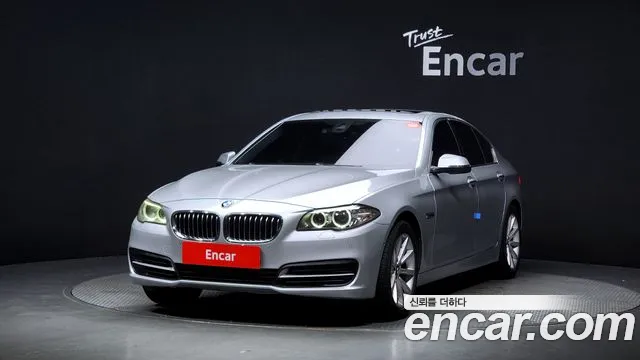 BMW 5-Series 2015 — photo 1
