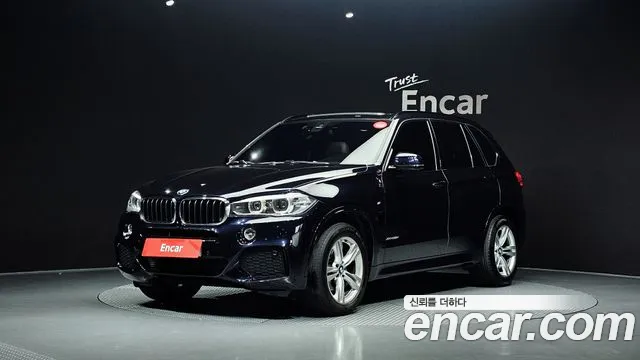 BMW X5 2018 — photo 1