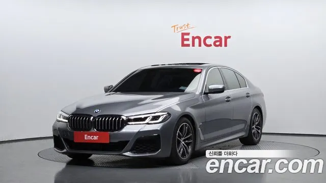 BMW 5-Series 2023 — photo 1
