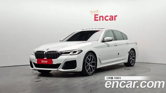 BMW 5-Series 2022 — photo 1