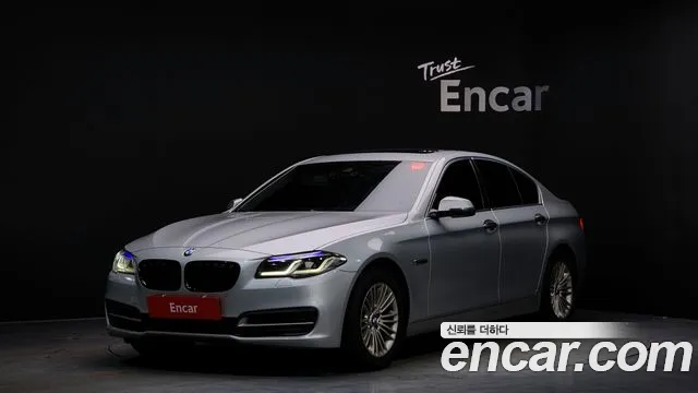 BMW 5-Series 2014 — photo 1