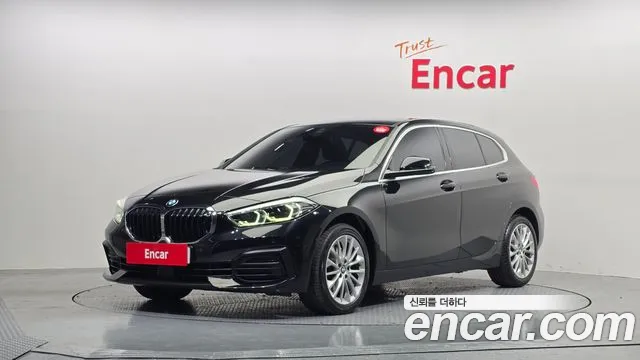 BMW 1-Series 2021 — photo 1