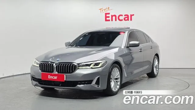 BMW 5-Series 2023 — photo 1