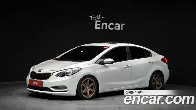 Kia K3 2015 — photo 1