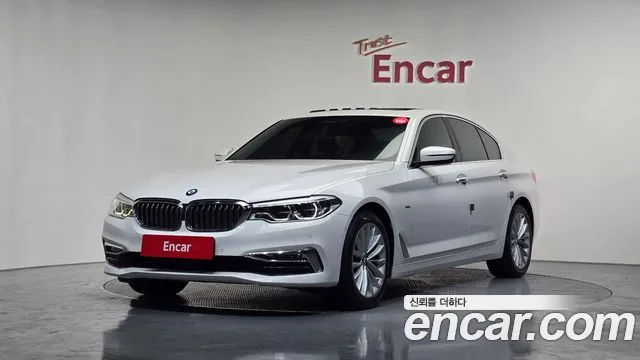 BMW 5-Series 2018 — photo 1