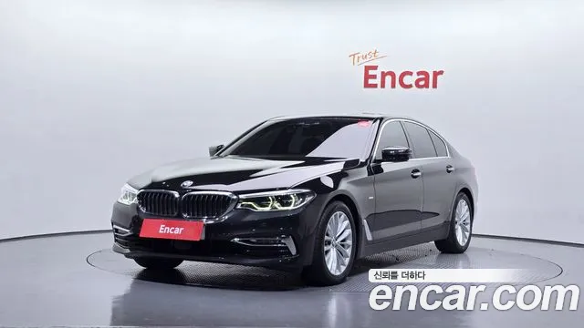 BMW 5-Series 2018 — photo 1