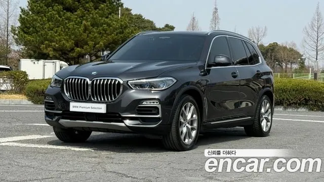 BMW X5 2021 — photo 1