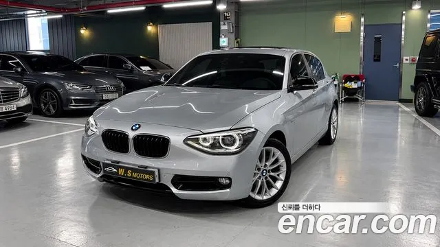 BMW 1-Series 2015 — photo 1
