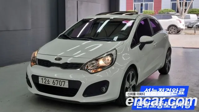 Kia pride 2012 — photo 1