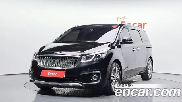 Kia Canival 2015 — photo 1