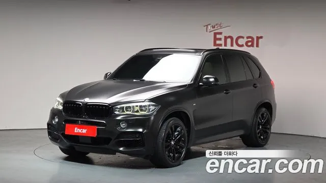 BMW X5 2014 — photo 1
