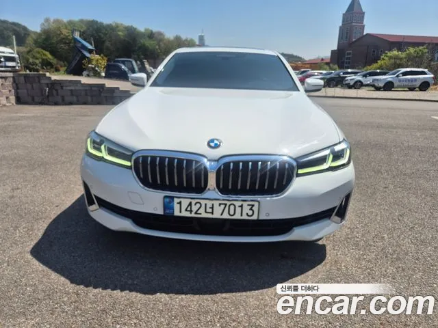 BMW 5-Series 2022 — photo 1