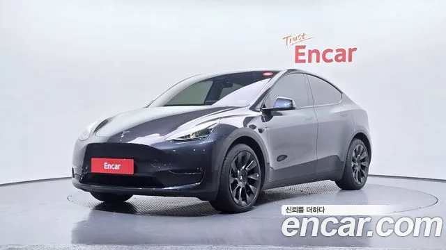 Tesla Model Y 2024 — photo 1