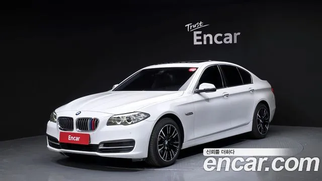 BMW 5-Series 2014 — photo 1