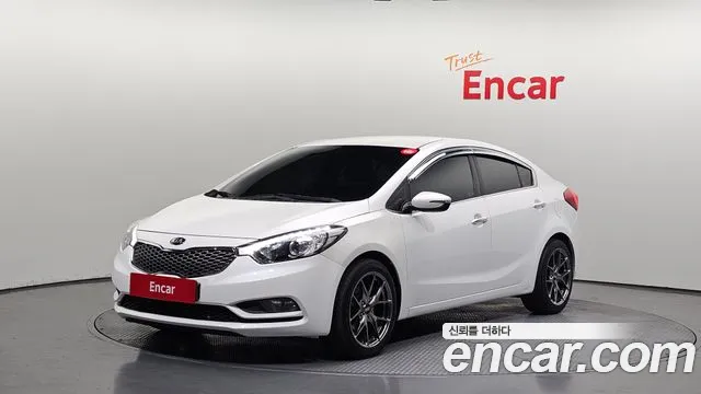 Kia K3 2013 — photo 1
