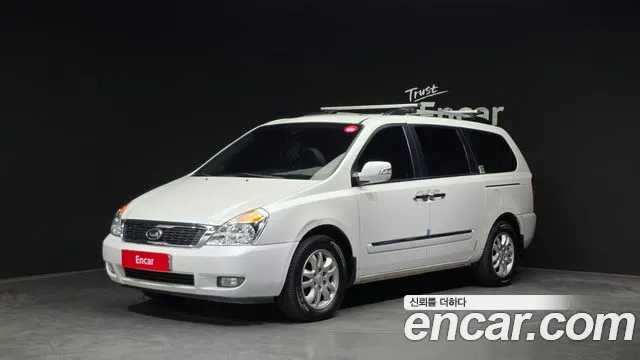 Kia Canival 2012 — photo 1
