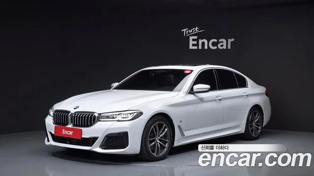 BMW 5-Series 2021 — photo 1