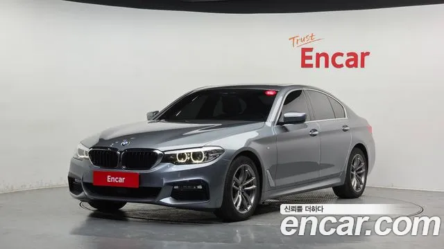 BMW 5-Series 2018 — photo 1