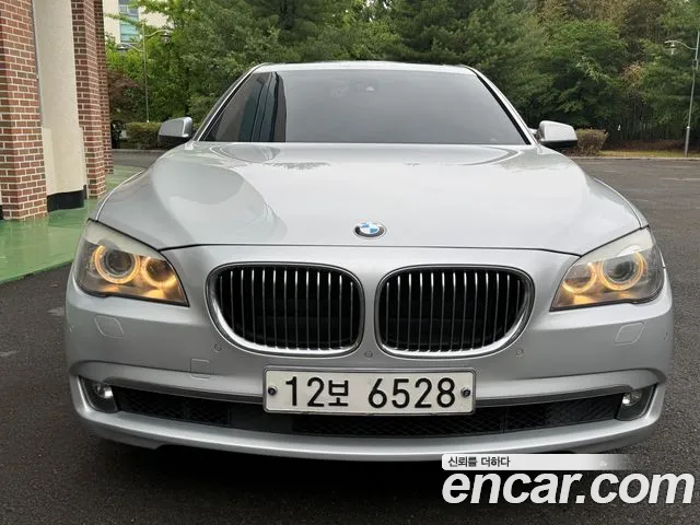 BMW 7-Series 2011 — photo 1