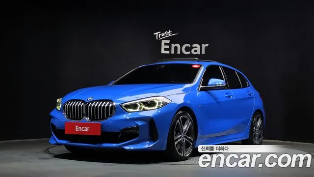 BMW 1-Series 2022 — photo 1