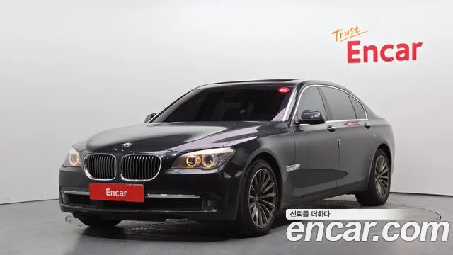 BMW 7-Series 2011 — photo 1