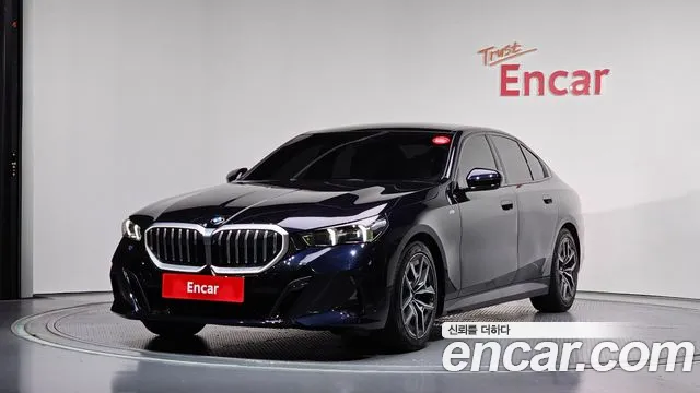BMW 5-Series 2024 — photo 1