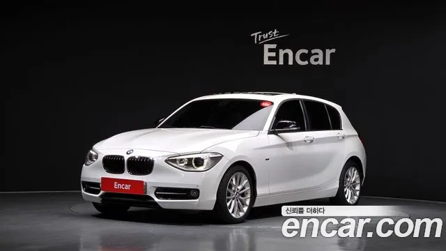 BMW 1-Series 2015 — photo 1