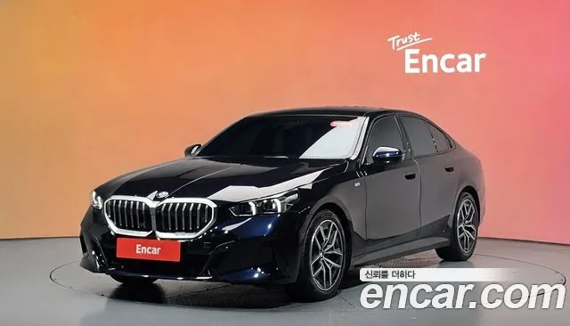 BMW 5-Series 2024 — photo 1