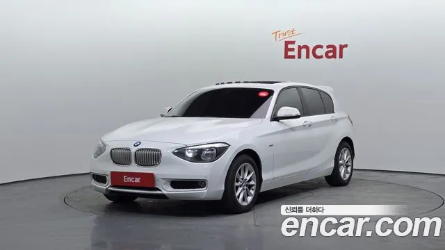 BMW 1-Series 2014 — photo 1