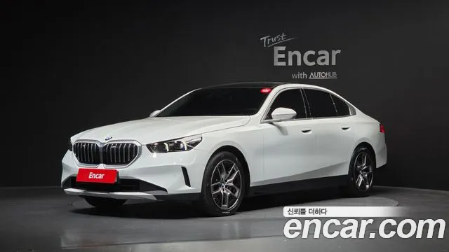 BMW 5-Series 2024 — photo 1