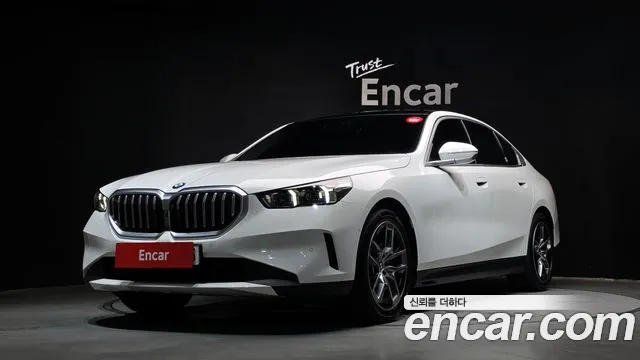 BMW 5-Series 2024 — photo 1