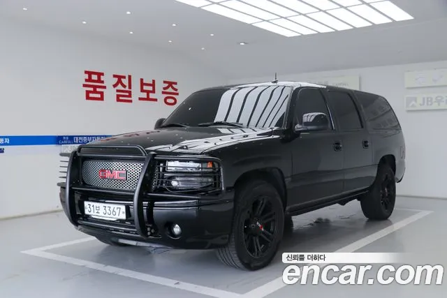 GMC Yukon 2003 — photo 1