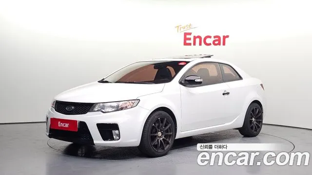Kia Porte 2010 — photo 1