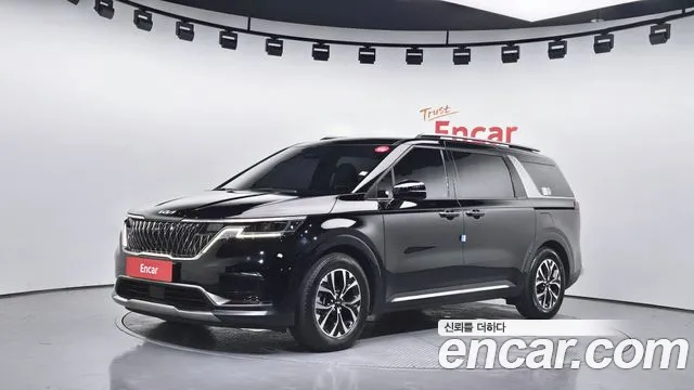 Kia Canival 2023 — photo 1