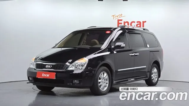 Kia Canival 2013 — photo 1
