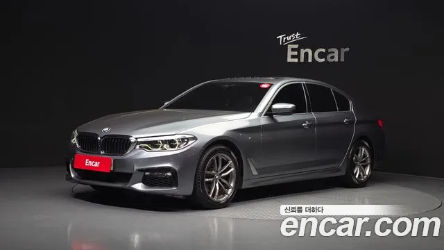 BMW 5-Series 2018 — photo 1