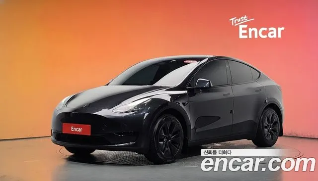 Tesla Model Y 2025 — photo 1