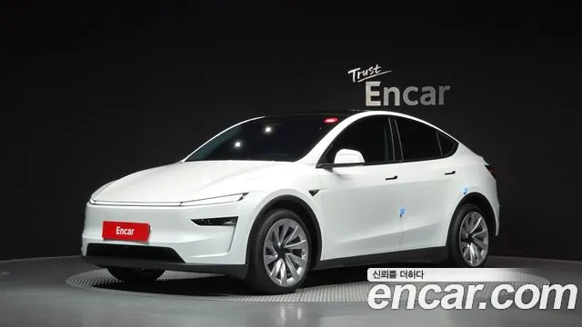 Tesla Model Y 2025 — photo 1